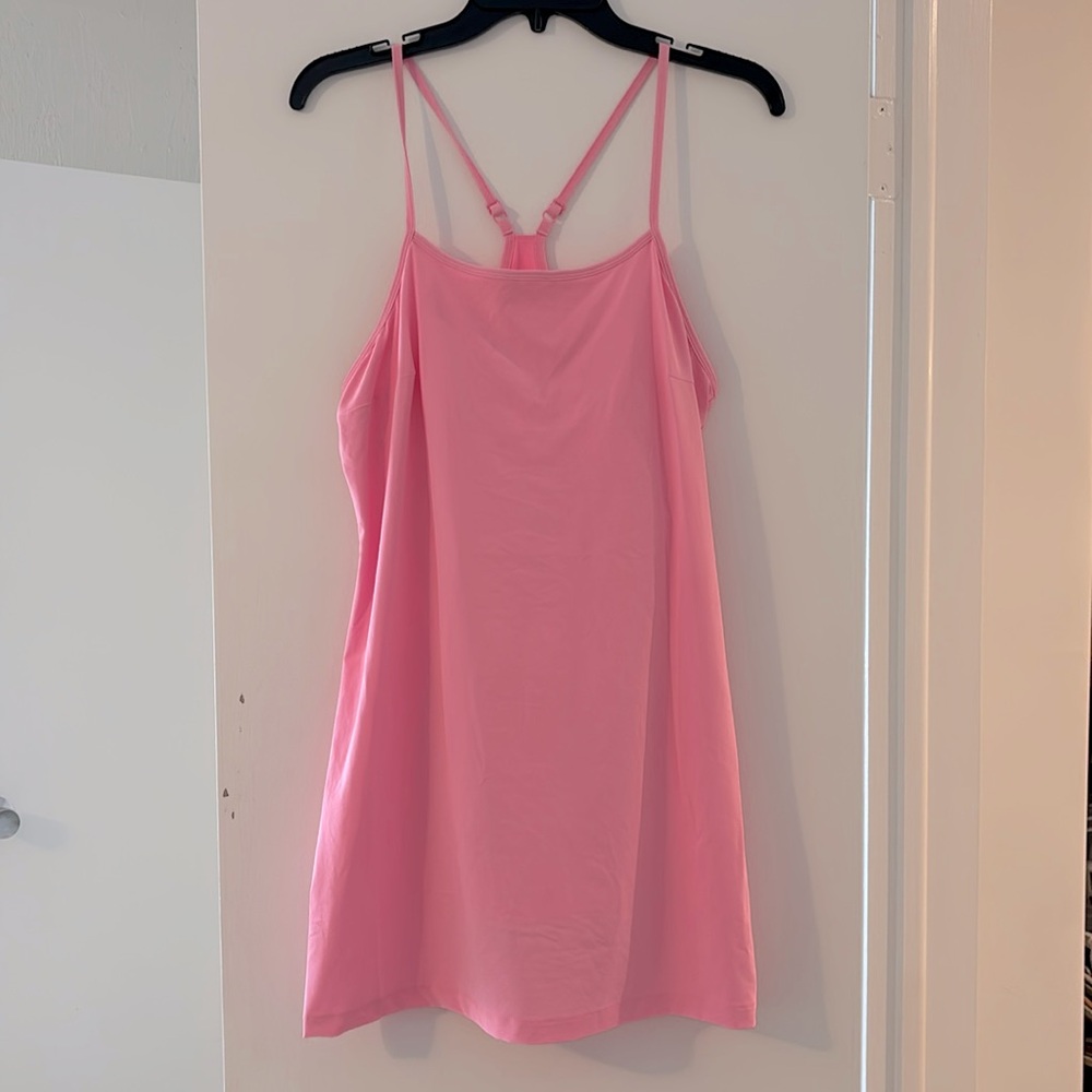 Barbiecore athletic dress with built in sports bra and bike shorts with pockets
